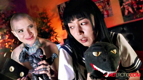 Marica tattooed Asian babe in sailor outfit with Godzilla toys