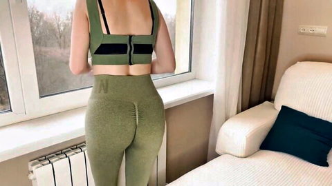 Curvy stepmom in tight green leggings showing massive butt from behind