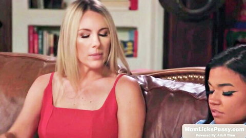 Blonde MILF Melody Marks and teen in intimate lesbian couch scene