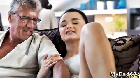 Itsxlilix in steamy couch embrace with older man, eyes closed in pleasure