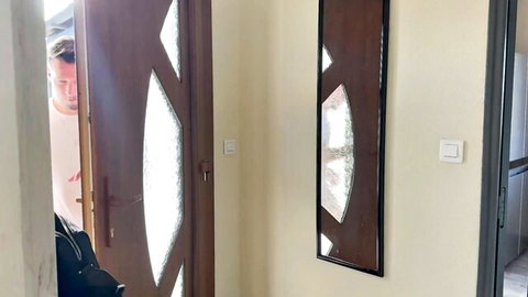 Curious boyfriend peeking through apartment door in amateur tease