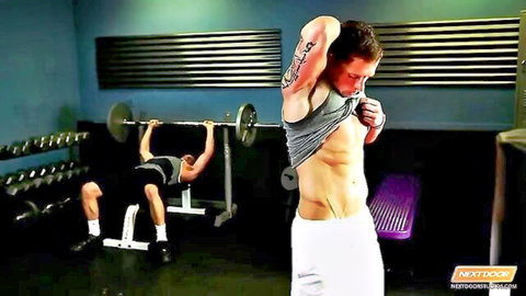 Athletic white studs flex ripped abs and bench press in gym locker room
