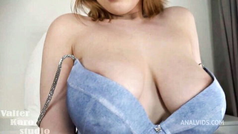 Berta's huge cleavage bursting from tight blue denim dress, redhead bombshell tease