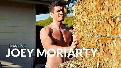 Joey Moriarty shirtless muscular hunk lifting hay bales