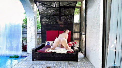 Anastasia Knight nude bent over outdoor bed, exposing tight ass and pussy