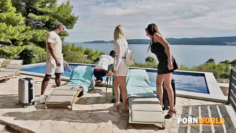 Sexy blondes in skimpy mini dresses teasing poolside with studs overlooking sea PornWorld