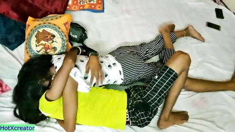 Tabinash and Sudipa Indian teens in intimate hug on bed