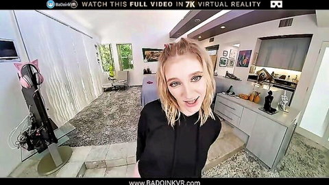 Petite blonde pornstar Melody Marks smiling in black hoodie with cat ears