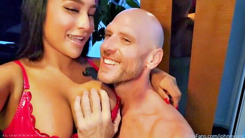 Yasmina Khan in red lace lingerie embracing bald hunk intimately