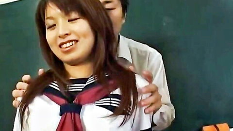 Japanese model Riko Araki in school uniform embraced intimately by man