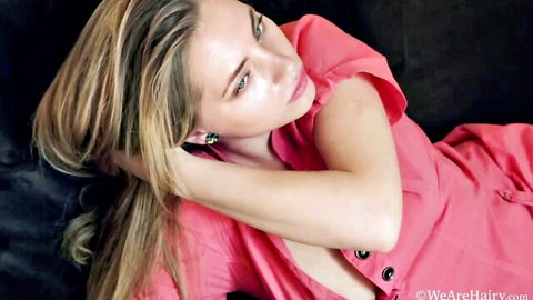 Hairy blonde beauty in pink dress lounging seductively
