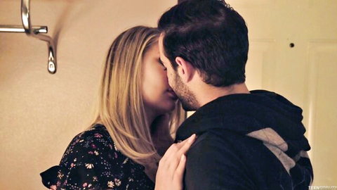 Blonde Lila Fray kissing Jake Adams passionately in intimate embrace