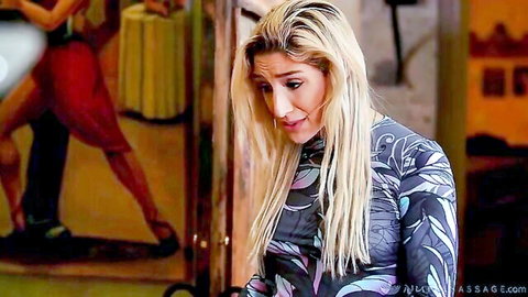 Busty blonde Abella Danger in teasing Nuru massage pose, steamy session