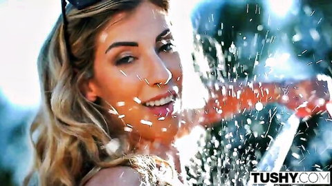 Shona blonde smiling with water splash in teasing outdoor anal preview