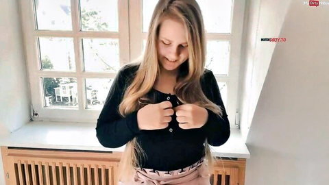 Maja Meer blonde smiling in black top and pink skirt tease