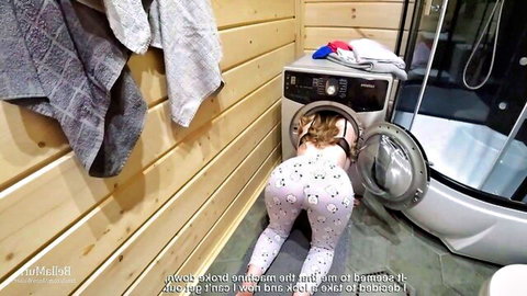 Young blonde bends over washing machine showing big ass in tight pink pajamas POV
