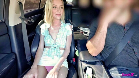 Blonde teen in car flashes pink panties and cleavage smiling at camera during casting couch