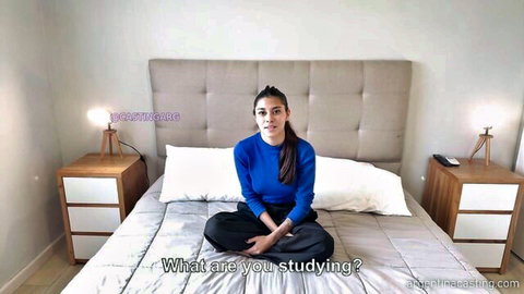 Naomi 18yo hot brunette sitting on bed in blue top for uncensored casting
