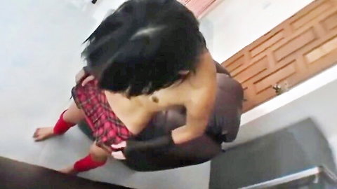 Tattooed Asian amateur in plaid skirt fucked doggy style from behind gripping hips POV