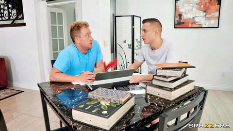 Two fit Caucasian men in casual tees studying books in Brazzers stepmom scene setup