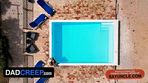 Ryan St Michael poolside aerial view in gay outdoor scene