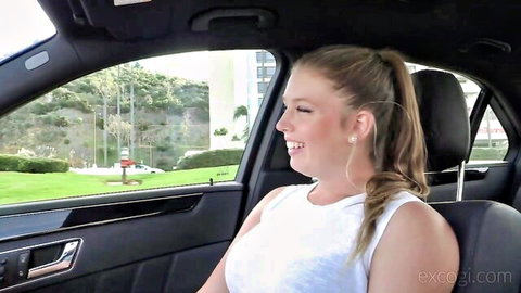Sarah smiling in car POV, blonde ponytail, white tank top, heartbeat ECG tease