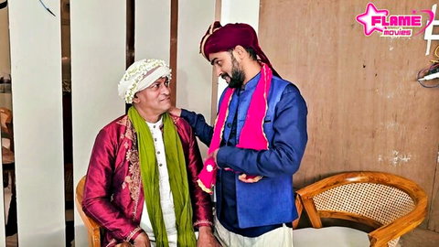 Indian father-in-law embracing son-in-law in traditional attire, MILF incest preview