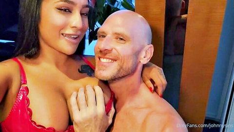 Yasmina Khan in red lingerie embraces Johnny Sins intimately