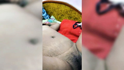 Blurry Desi man nude on bed, exposed hairy genitals and belly