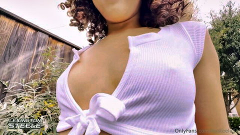 Willow Ryder teasing in tied white crop top, big cleavage on OnlyFans