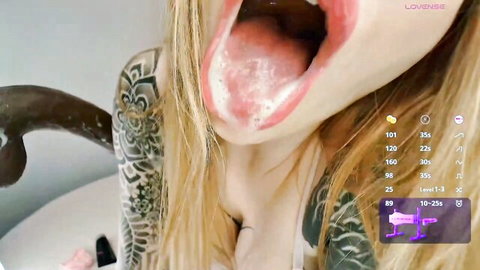 Lil Shouty Bitch blonde with tattoos, mouth open with cum from big black dick