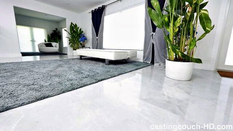 Empty modern casting couch room with white chaise lounge ready for amateur blowjobs and rough sex auditions
