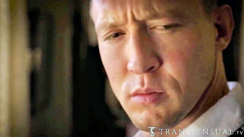 Intense close-up of rugged DILF stepdad gazing in taboo trans video