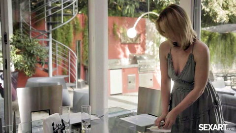 Lilly Bell in sexy gray halter dress at table with Chloe Amour