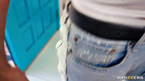 Man with open jeans in teasing pose near blue door, Brazzers threesome preview
