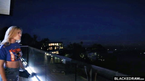Ashley Alexander blonde bombshell in sexy blue crop top on night balcony