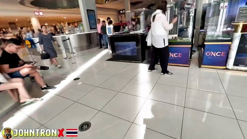 Hot Asian babe in white blouse seduces in public arcade at Joy 1