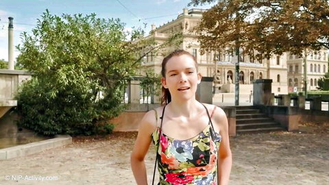 Eiko in Prague 2nd shoot, smiling slim babe in floral dress outdoors