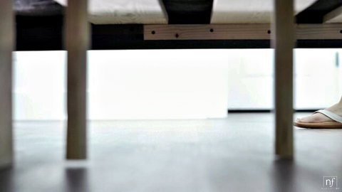 Serena Hill's bare soles and flip flops in teasing under-bed view