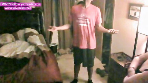 Amateur BBC man in pink shirt with arms out, BBW woman nearby in explicit pose