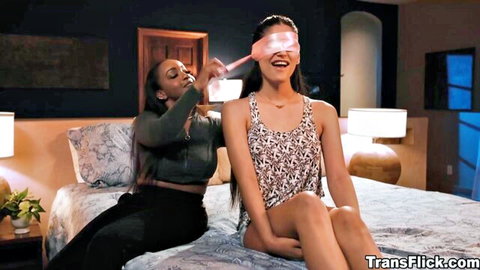 Lily Starfire blindfolded and teased by Zariah Aura in steamy lesbian scene