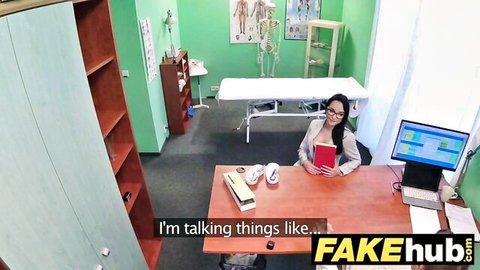 Hot Portuguese woman in glasses at desk in sexy clinic roleplay