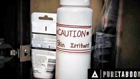 Close-up of white CAUTION Skin Irritant bottle with PureTaboo watermark in cabinet