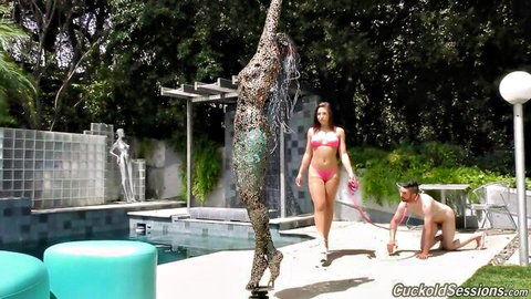 Abella Danger in pink bikini leads naked cuckold on leash outdoors