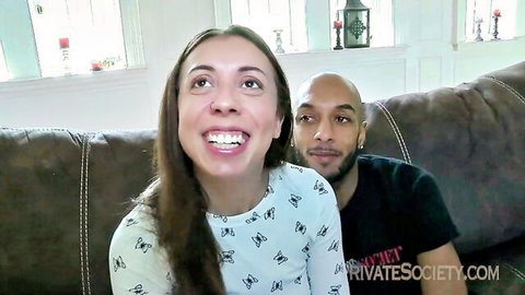 Excited brunette with small tits and black stud smiling in IR adult preview