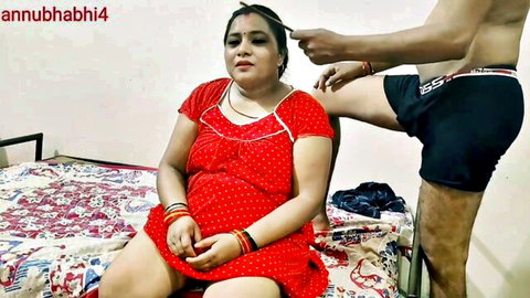 Curvy Indian bhabhi in short red polka dot dress teased by shirtless man in black underwear touching her hair