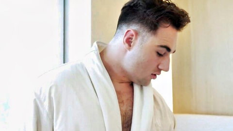 Michael Seraph and Michael Boston in open white robes, steamy shower tease