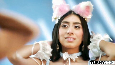 Brunette beauty in pink cat ears and white lace lingerie smiling seductively
