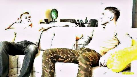 Johnny Riley and Damien Hyde in casual tanks and pants on couch, teasing gay fun