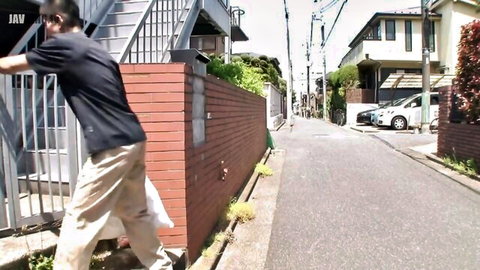 Man approaching home on quiet Japanese street, naughty housewife scene setup